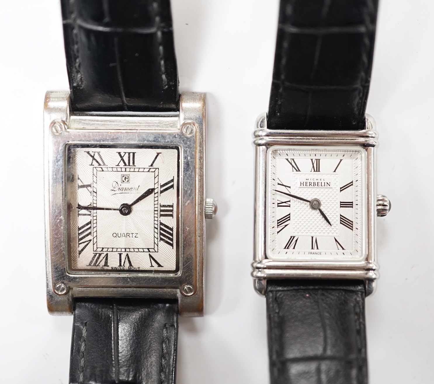 A lady's modern stainless steel Michel Herbelin rectangular dial quartz wrist watch, on a Herbelin leather strap, with original box, together with a stainless steel Diamant quartz wrist watch.